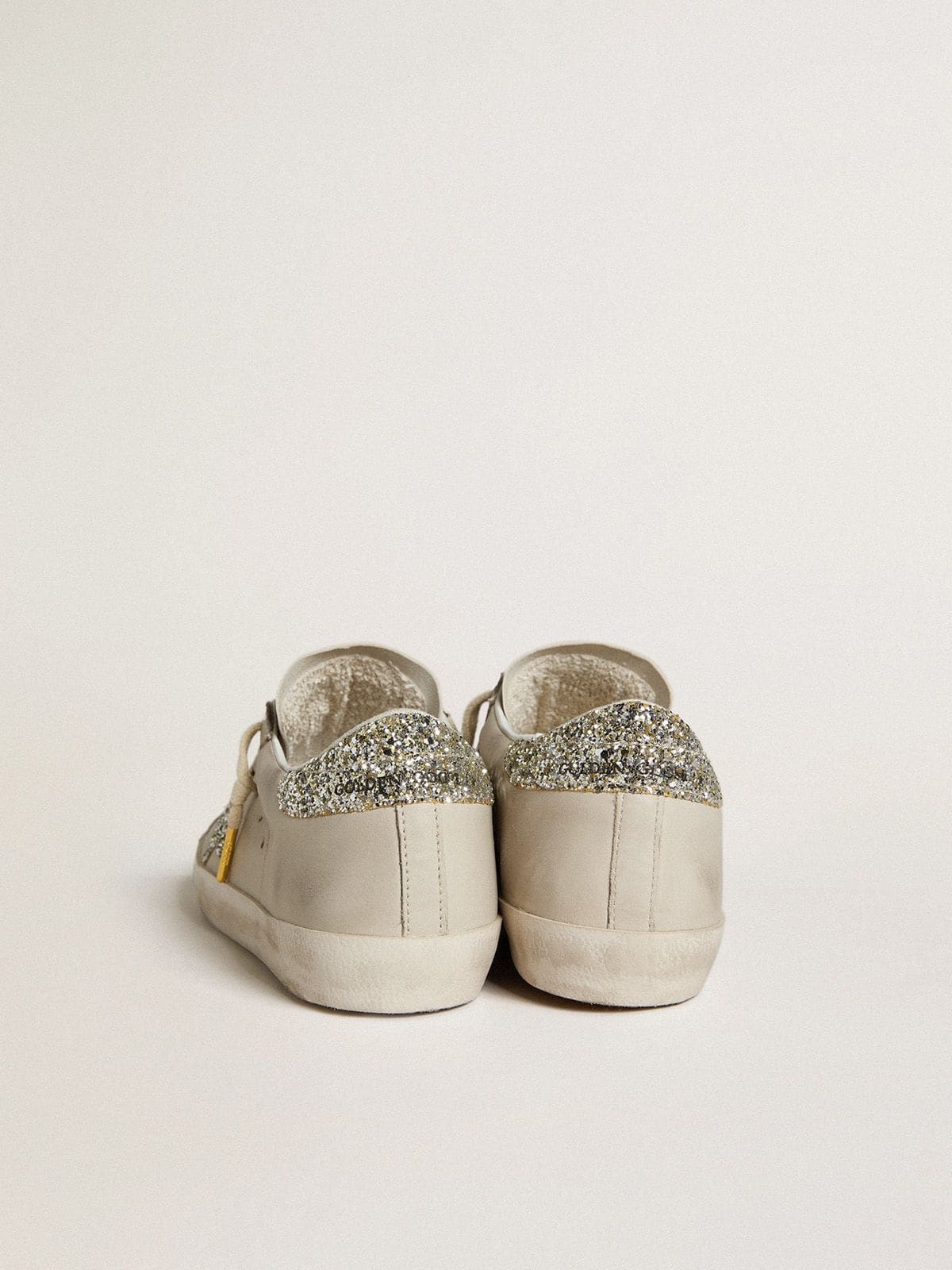 LTD in nappa avorio con stella e talloncino in glitter platino