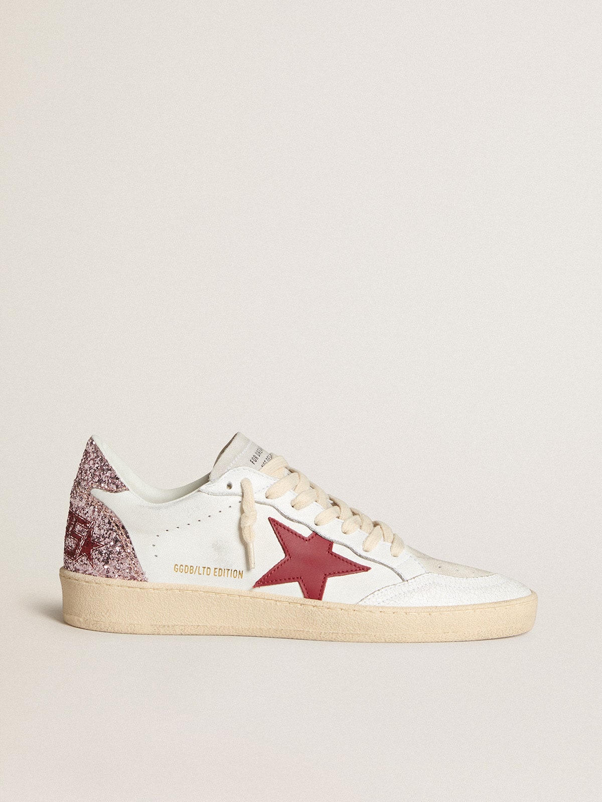 LTD con stella in pelle rossa e talloncino in glitter rosa