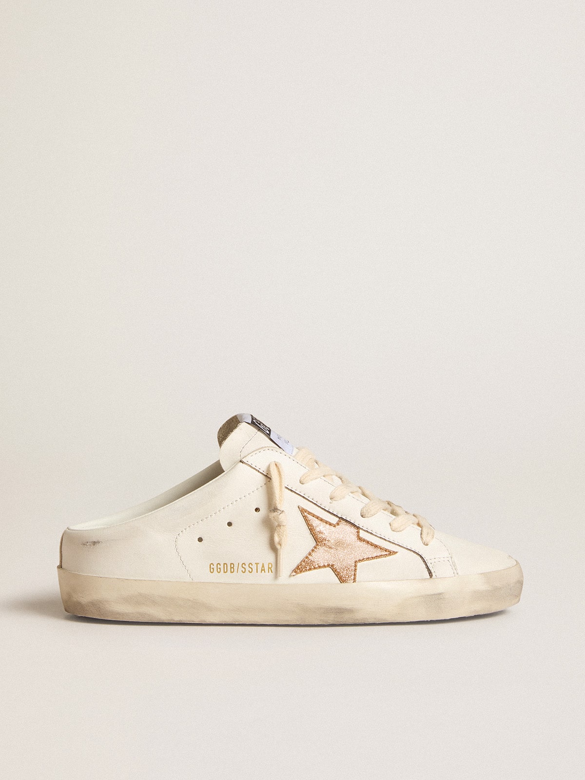 Sabot in pelle con stella in glitter oro plastificati