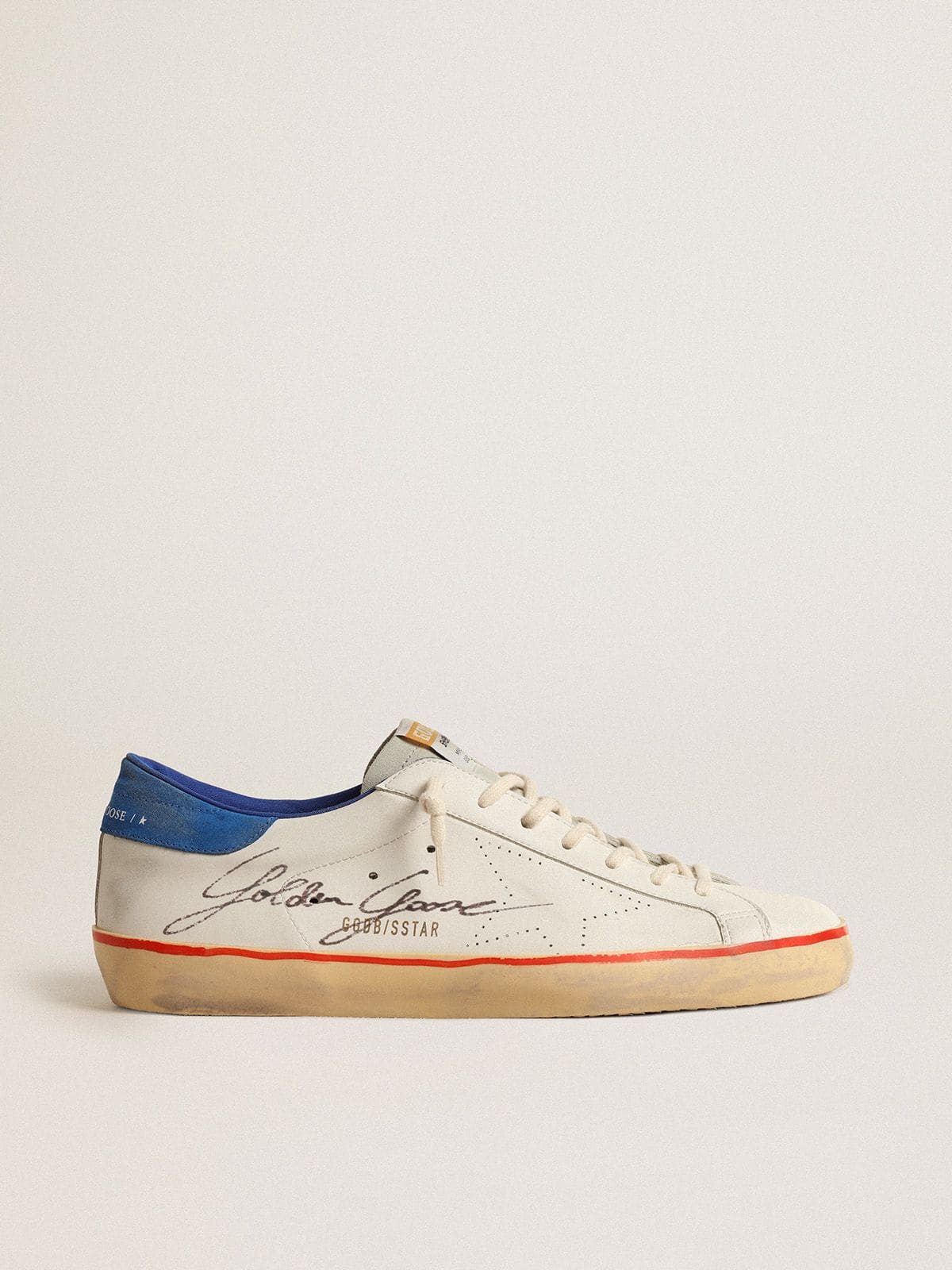 Stella traforata e talloncino in suede blu