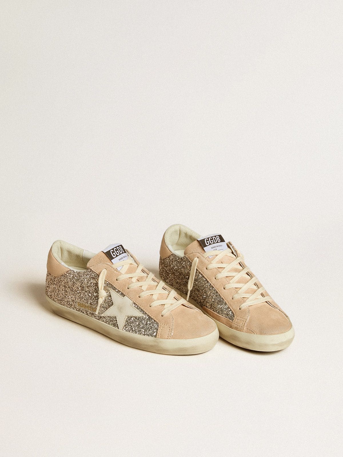 Glitter argento con stella e talloncino in pelle