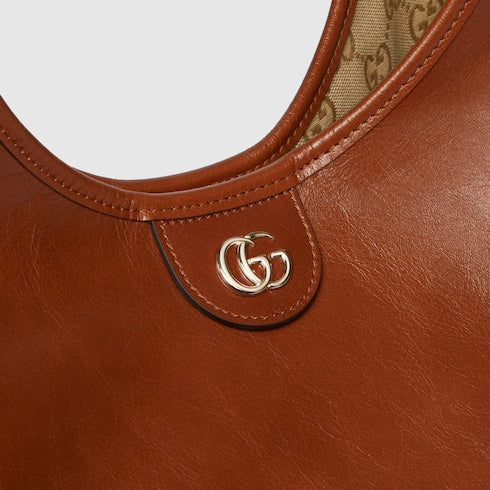 Borsa shopping GG Giglio misura piccola in pelle marrone scuro
