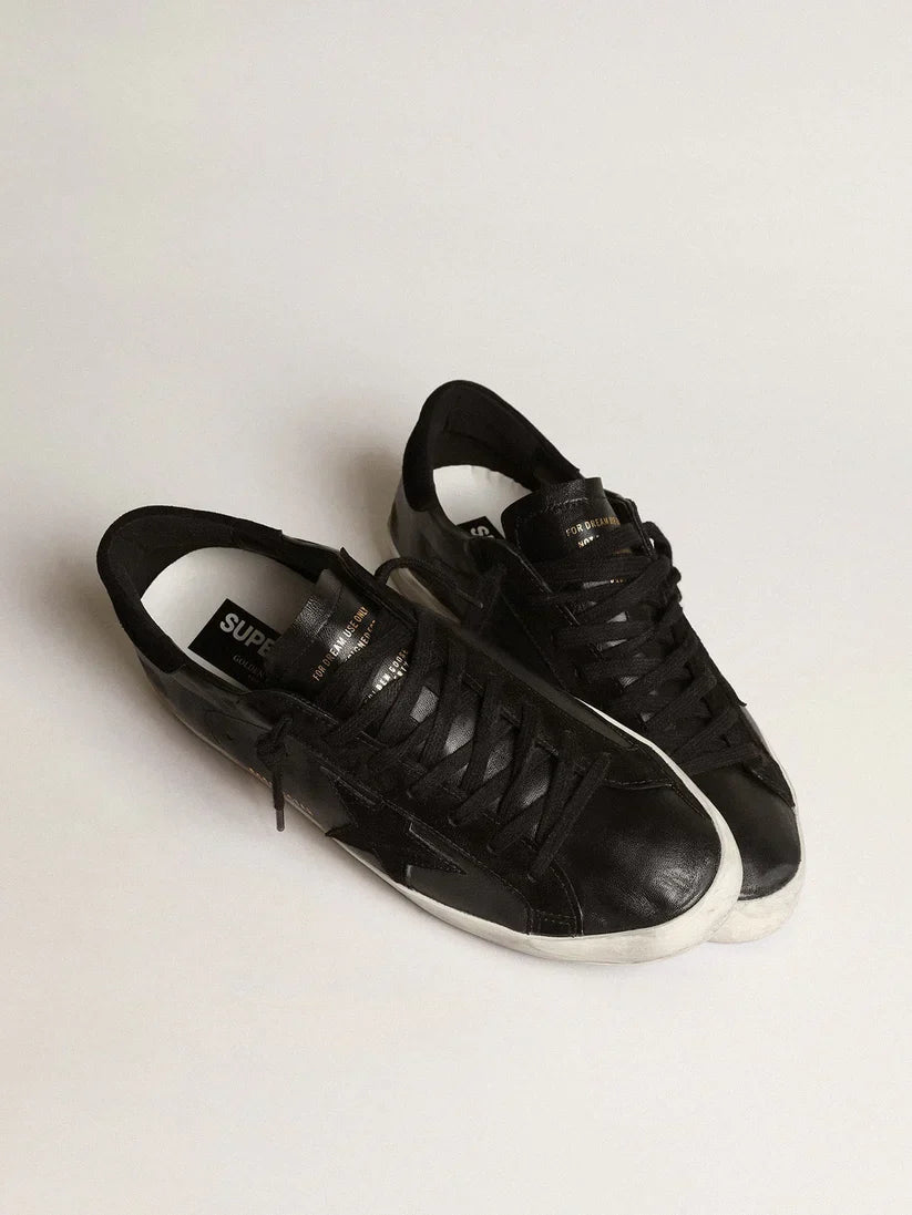 Nappa nera con stella e talloncino in suede nero
