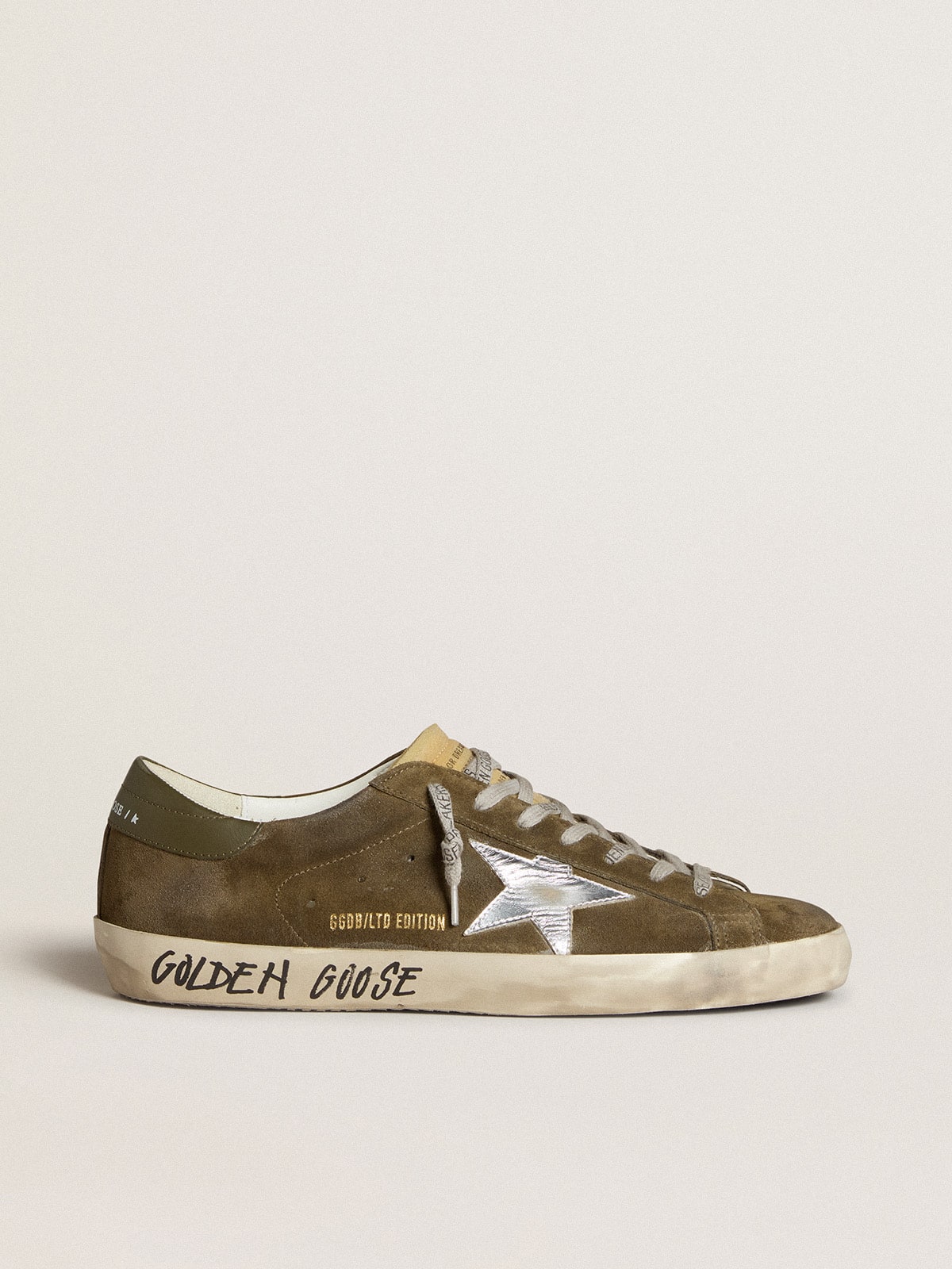 LTD in suede con stella in pelle laminata e talloncino in pelle