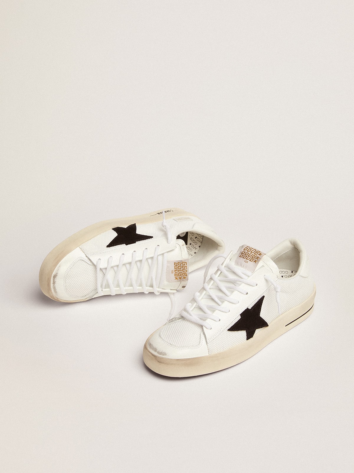 Rete bianca con stella in suede nero
