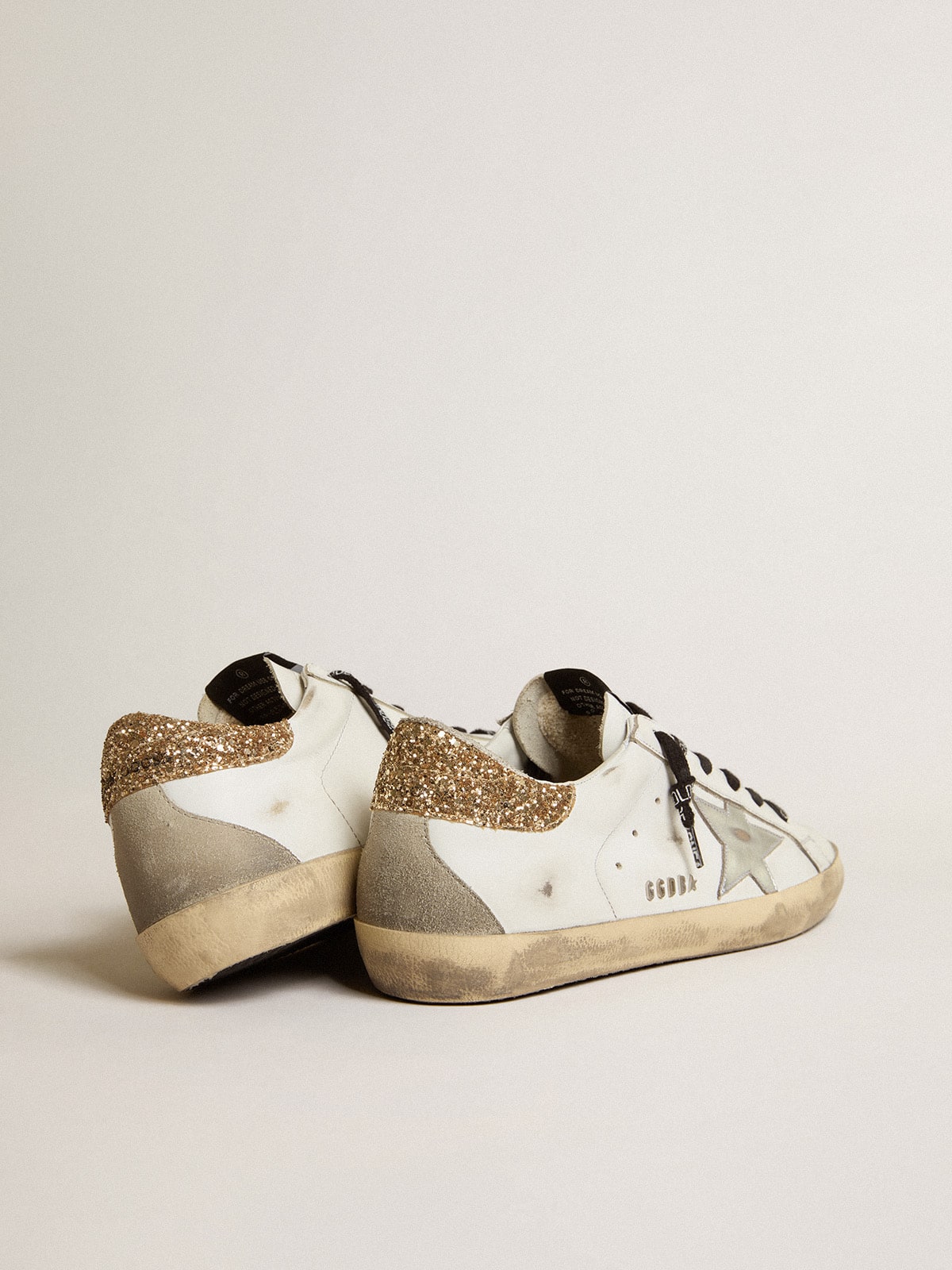 Bianche in pelle con talloncino glitter