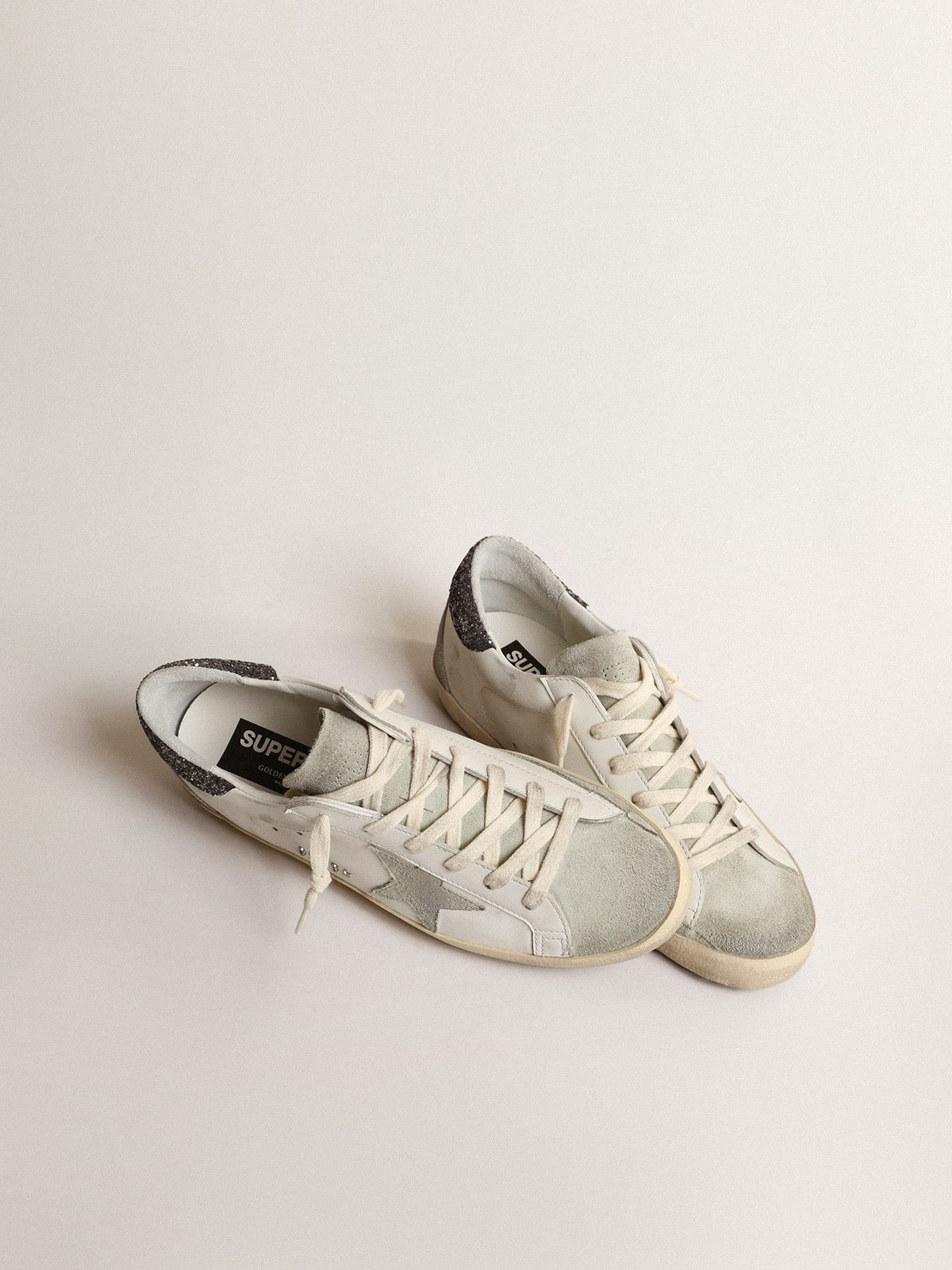 Stella grigia e talloncino in glitter grigio scuro