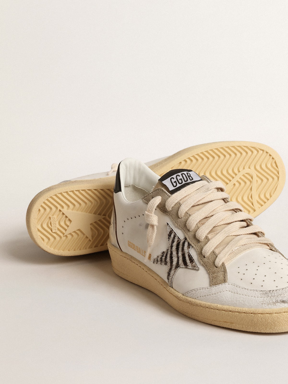 LTD con stella zebrata e inserto in pelle laminata