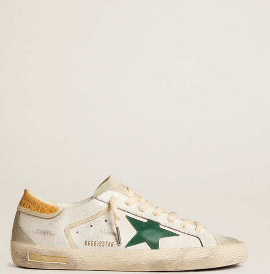 Stella in suede verde e talloncino in pelle cocco gialla
